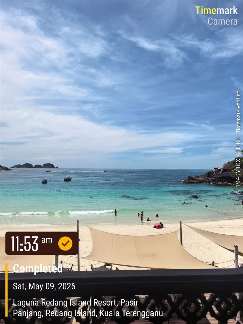 Beach scene at Laguna Redang Island Resort with turquoise water, white sand, and sunshades; overlay shows 11:53 am, Completed, May 9, 2026.